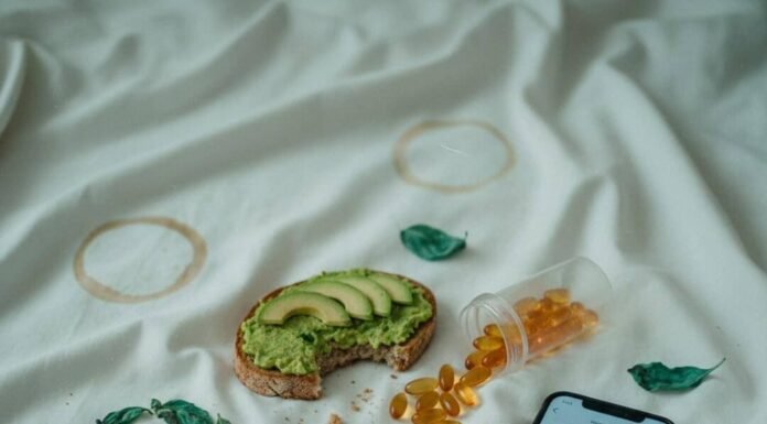 The Link Between Diet and Depression: What Science Says Avocado toast, pills, and mood app on rumpled sheets.